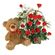 teddy bear with red roses. Krasnoyarsk