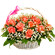 basket of pink roses with babys breath. Krasnoyarsk
